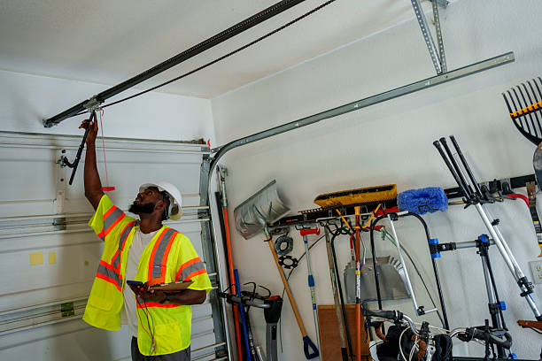 Professional Garage Door Panel Replacement technician working in Monroe County County, OH